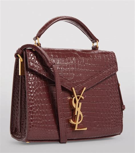 ysl cassandra bag top handle|CASSANDRA Mini top handle bag in grain de poudre  .